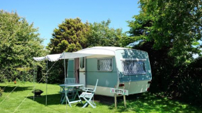 KItty unique 60s caravan set in pretty garden